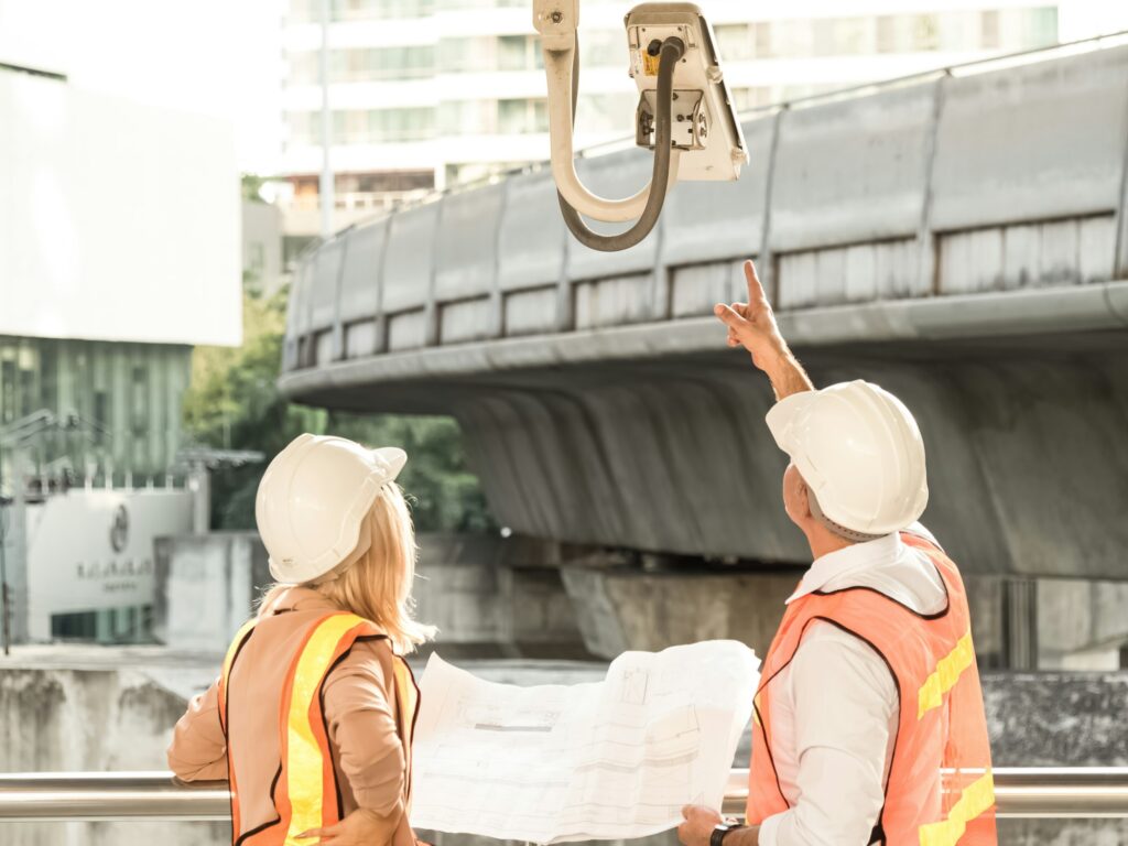 The chief engineer team is meeting to look at the city structure and electric train CCTV plan in ord
